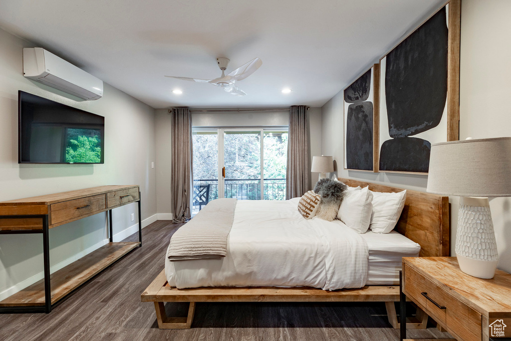 Bedroom featuring a wall mounted AC, access to outside, dark wood-style flooring, recessed lighting, and a ceiling fan