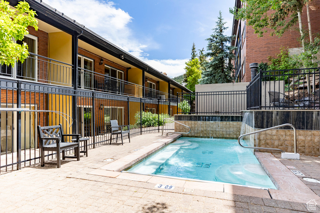 View of pool featuring a pool and a patio area