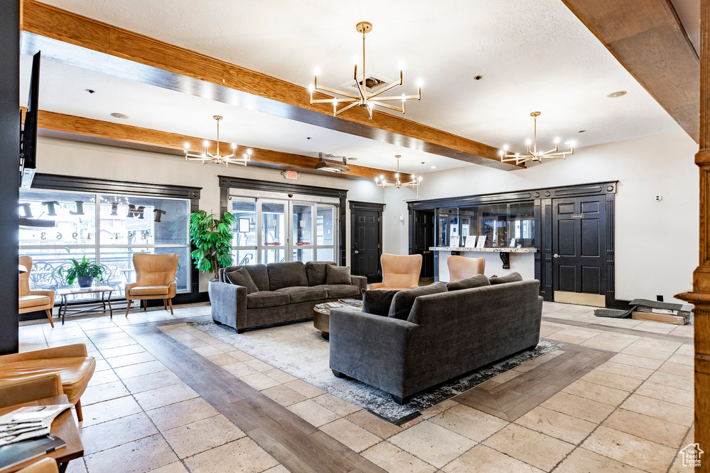 Lobby featuring beamed ceiling and recessed lighting
