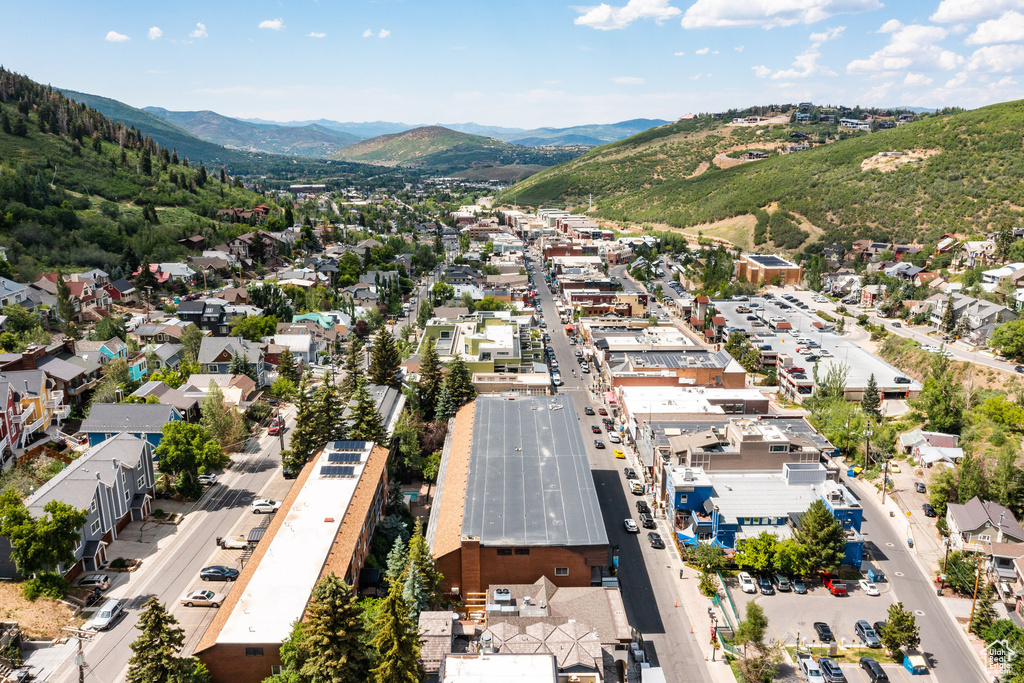 Aerial view of property's location with nearby suburban area