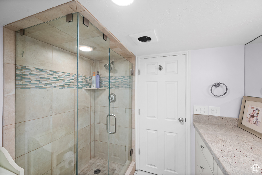 Bathroom featuring a stall shower