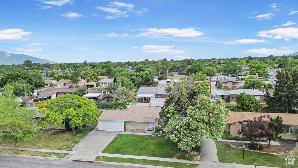 Aerial view of residential area with mountains