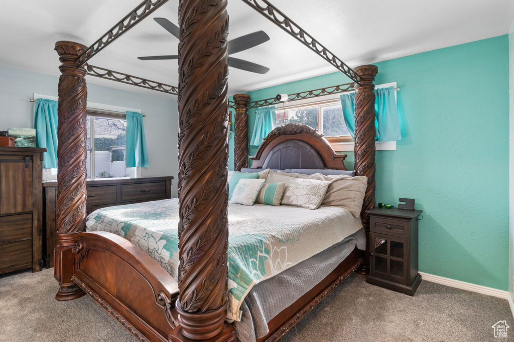 Bedroom featuring carpet flooring and ceiling fan