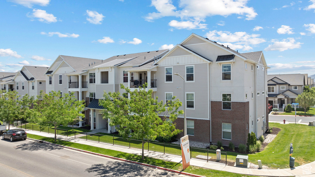 View of building exterior with a residential view