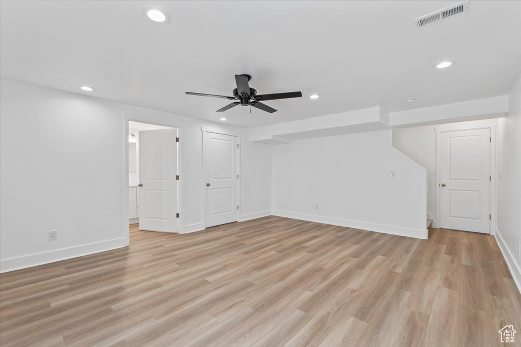 Unfurnished living room featuring recessed lighting, light wood-type flooring, and a ceiling fan