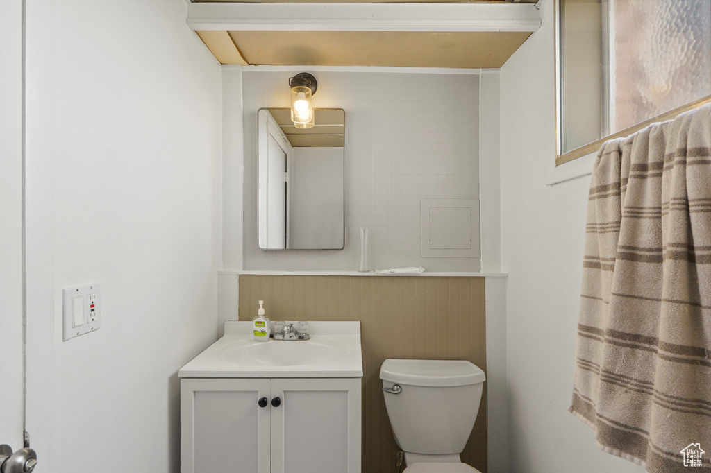 Bathroom with toilet and vanity