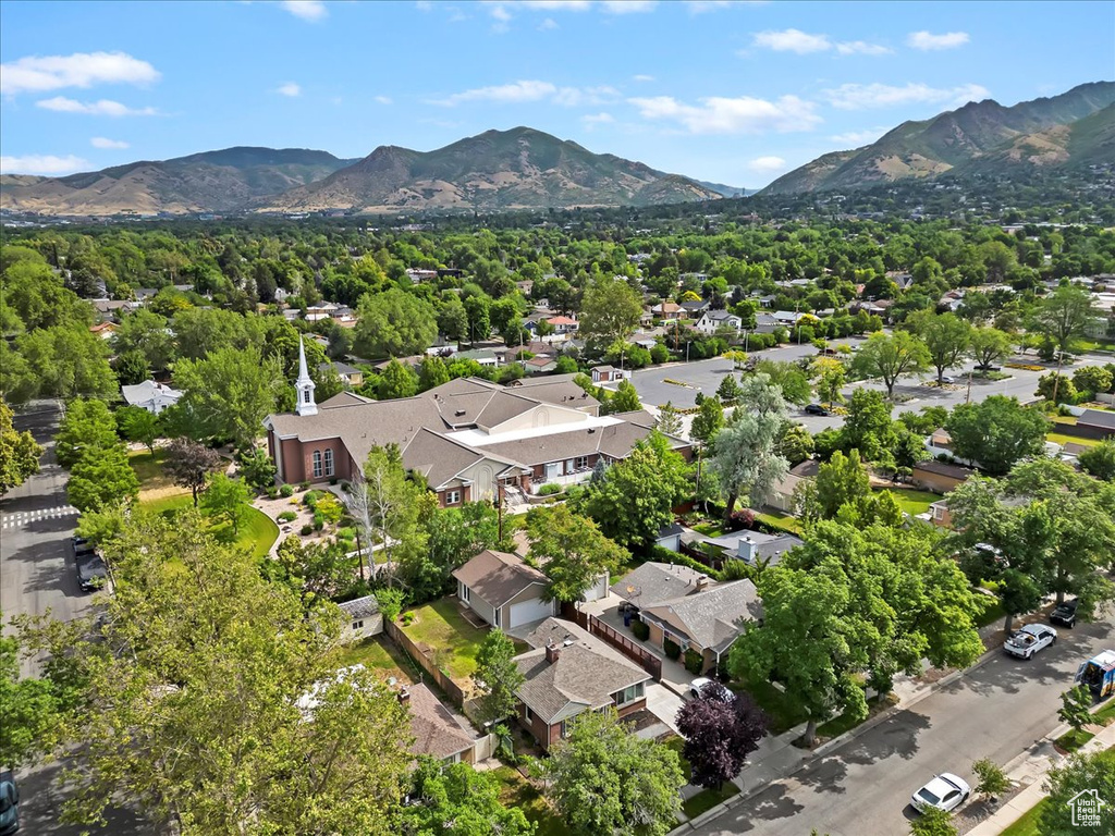Aerial view of residential area with a mountain backdrop