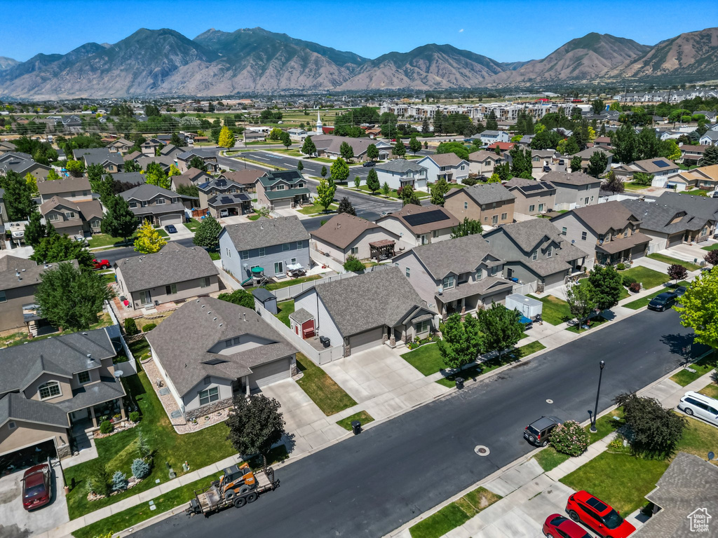 Aerial view of residential area with a mountainous background