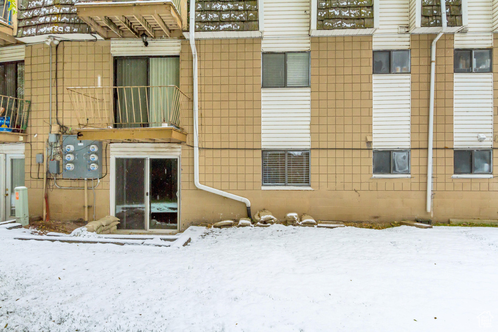 View of snow covered property