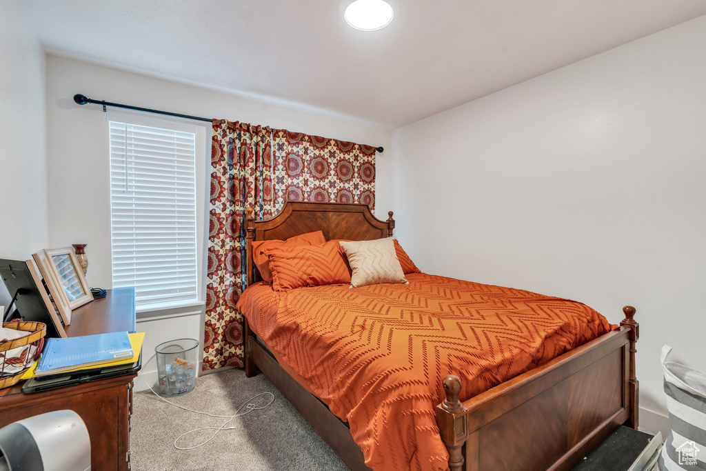 Bedroom featuring carpet floors
