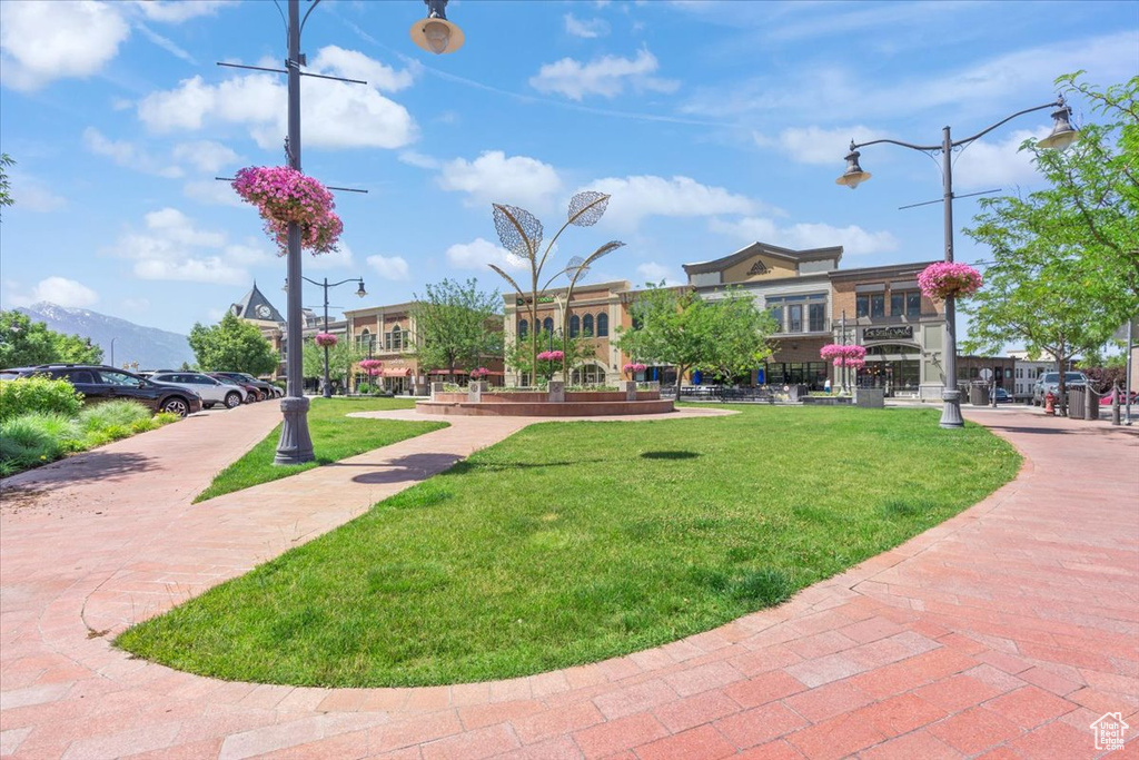 Surrounding community featuring a lawn
