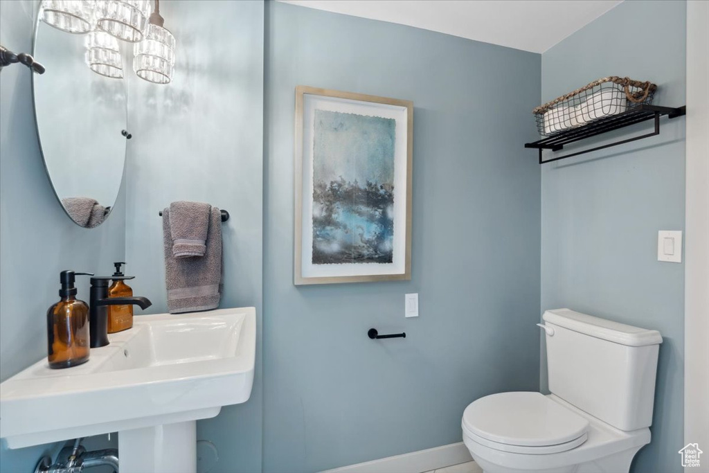 Bathroom featuring a sink and toilet
