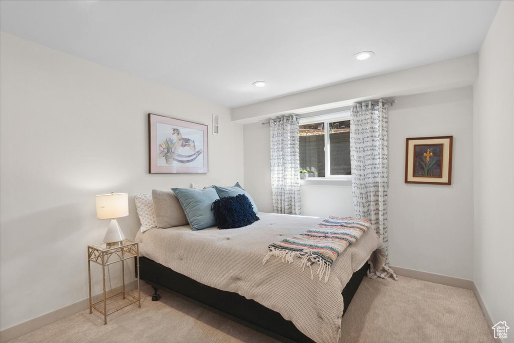 Bedroom featuring carpet flooring and recessed lighting
