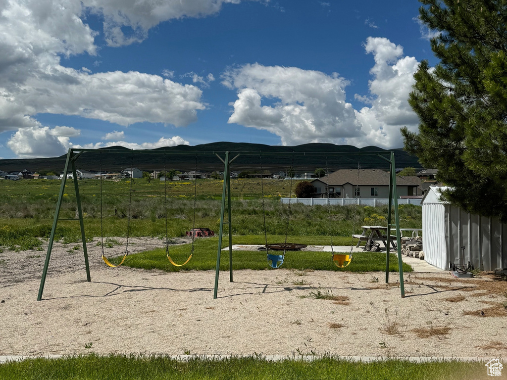 Communal playground with a mountain view