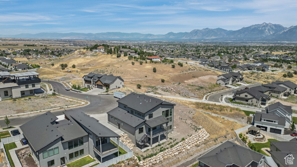 Aerial perspective of suburban area with mountains
