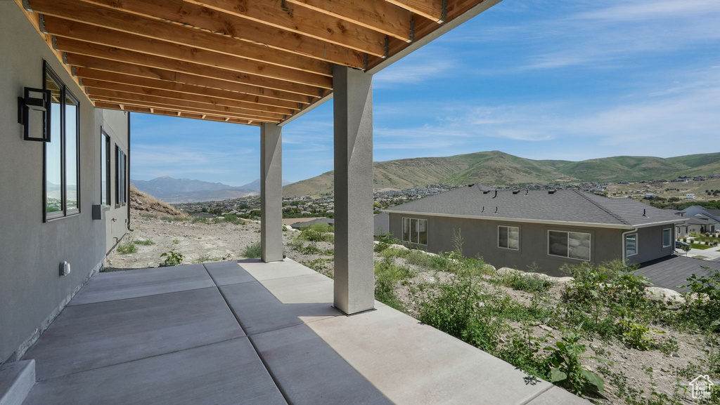 View of patio with a mountain view