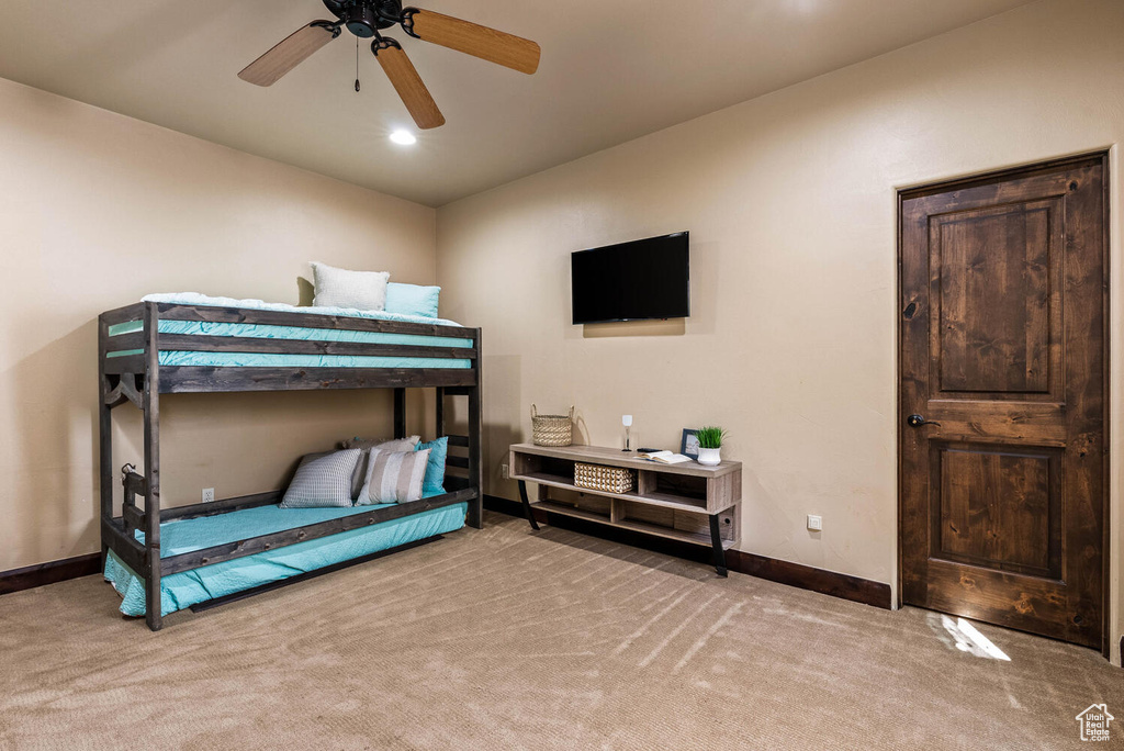 Bedroom with carpet floors and ceiling fan