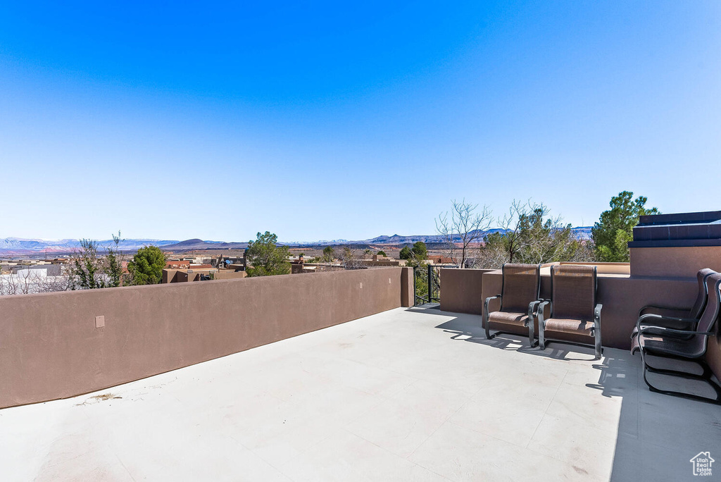 View of patio with a mountain view