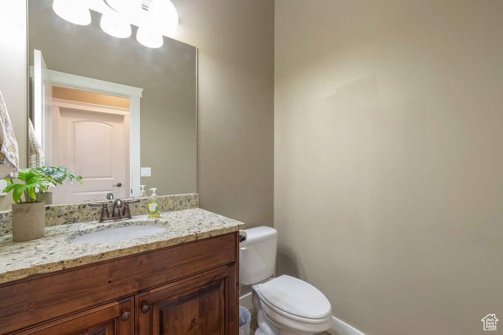 Half bath with toilet and vanity