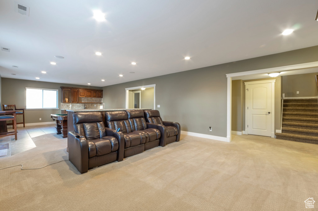 Cinema with light carpet and recessed lighting