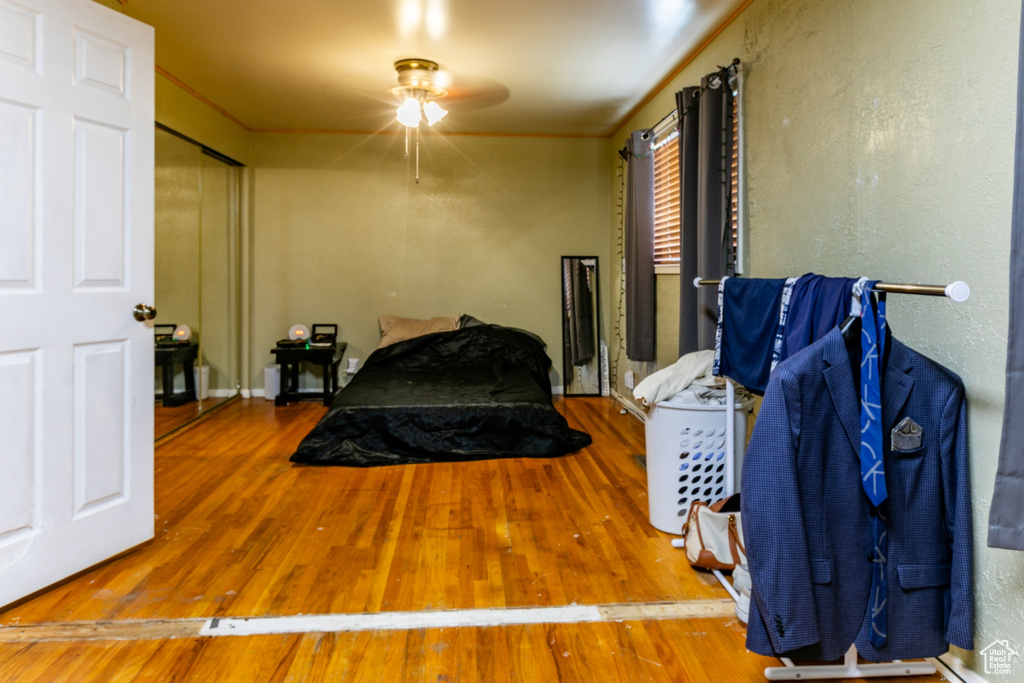Bedroom with wood finished floors