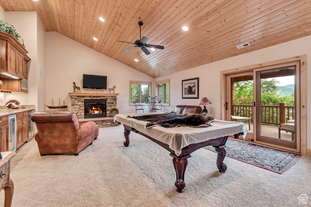 Recreation room featuring light colored carpet, pool table, wood ceiling, vaulted ceiling, and recessed lighting