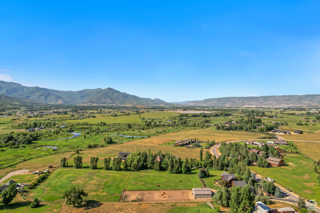 Overview of rural landscape with a mountainous background