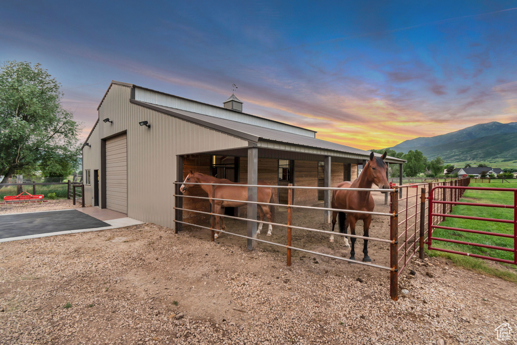 Stable featuring a mountain view
