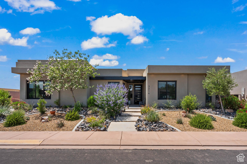 Southwest-style home with stucco siding
