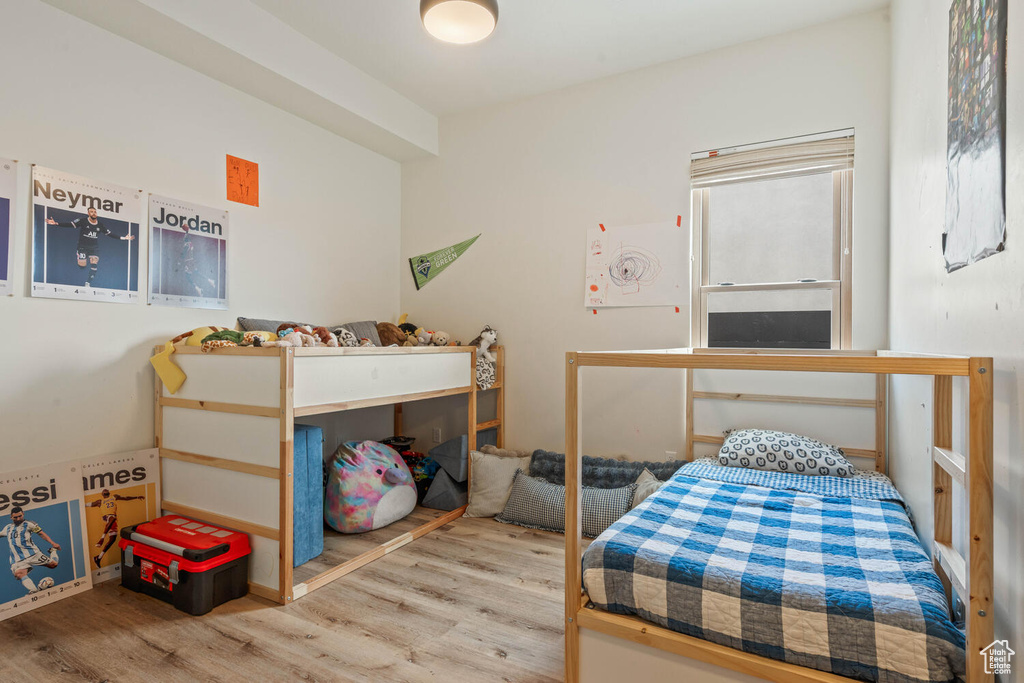 Bedroom featuring wood finished floors