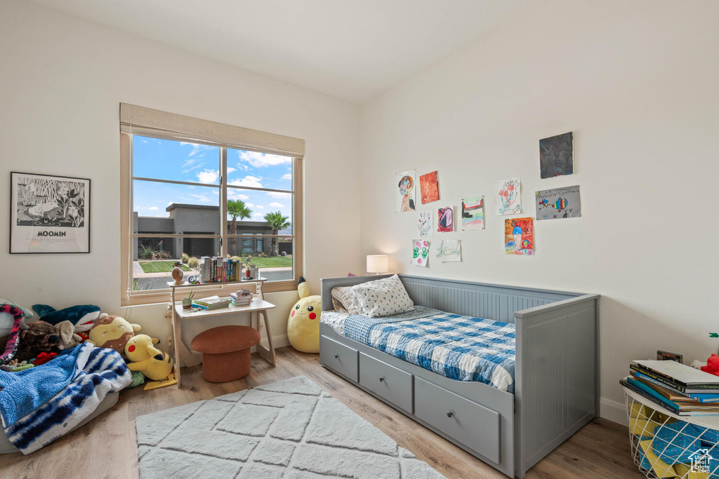 Bedroom featuring wood finished floors