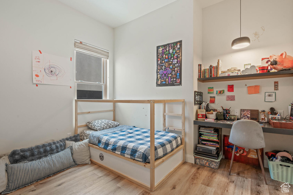 Bedroom featuring wood finished floors