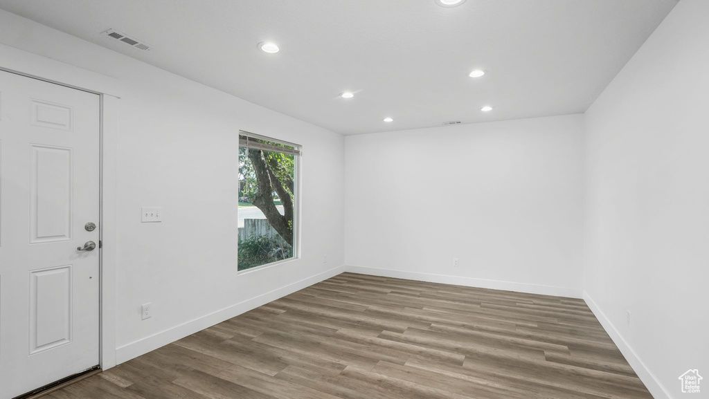 Spare room with recessed lighting and wood finished floors