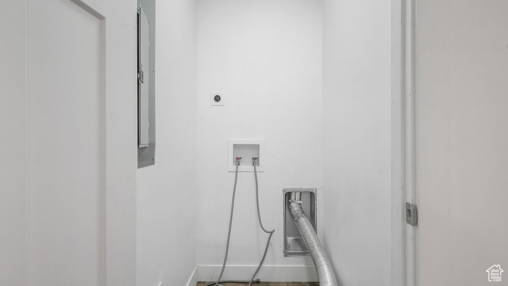 Laundry room with hookup for a washing machine and hookup for an electric dryer