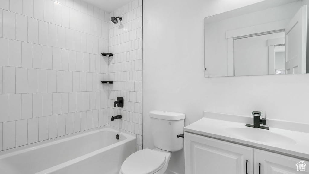 Full bathroom featuring vanity and shower / tub combination
