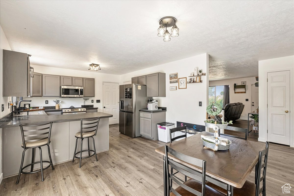 Dining space featuring light wood-style floors
