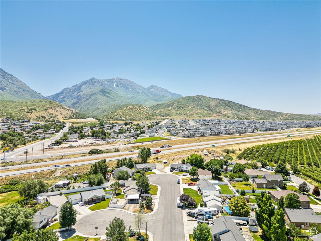 Aerial view of residential area featuring mountains