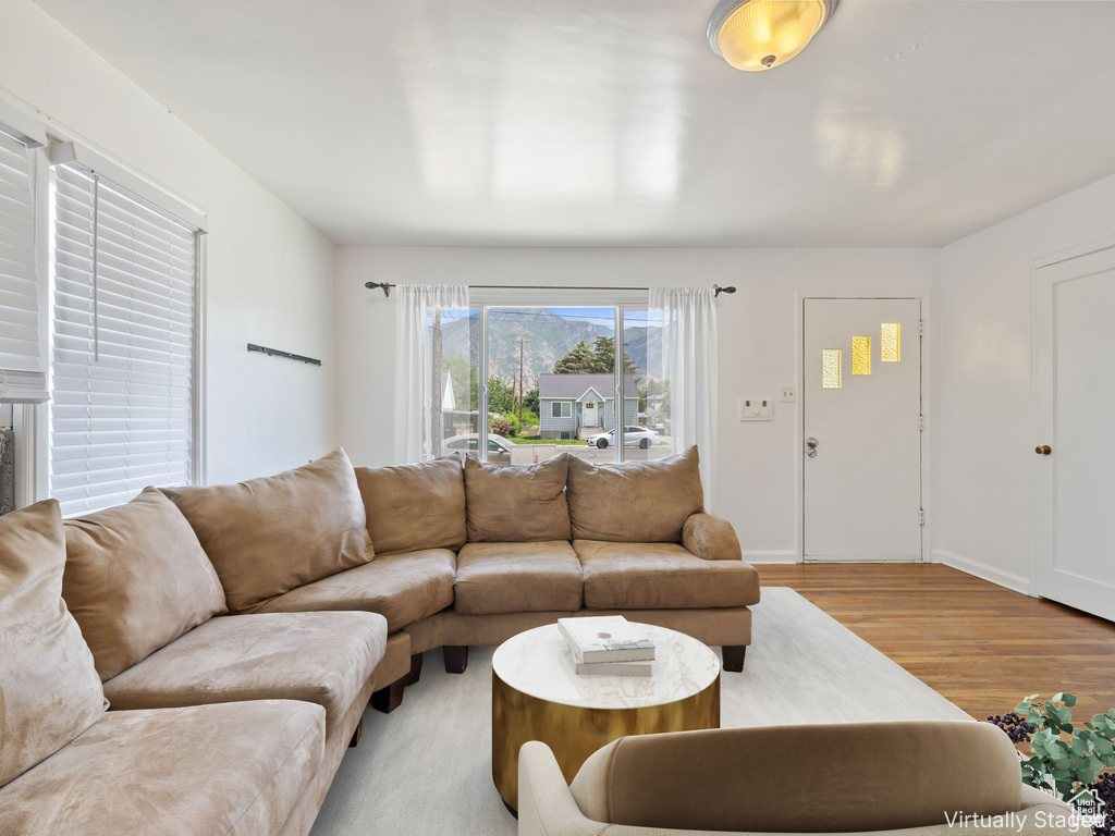Living room with light wood-type flooring