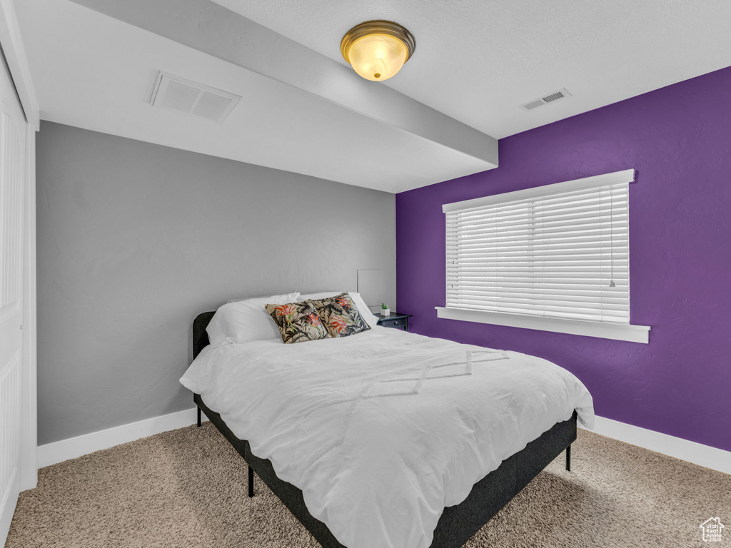 Bedroom featuring carpet flooring
