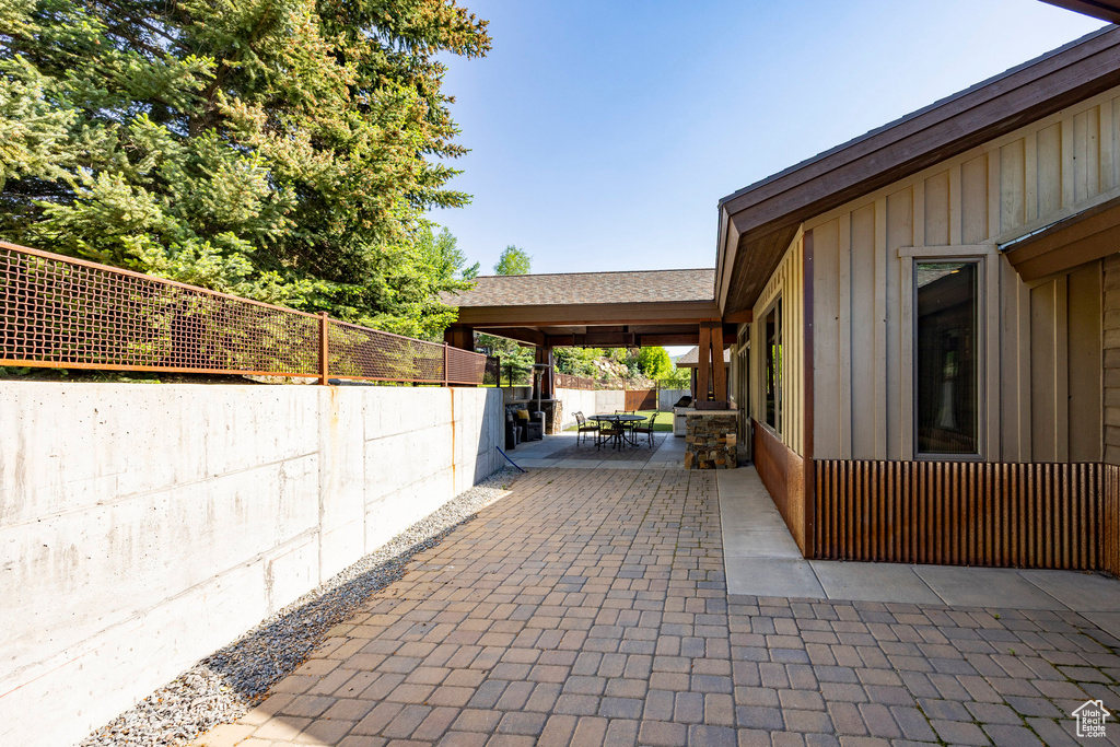 View of patio with outdoor dining area
