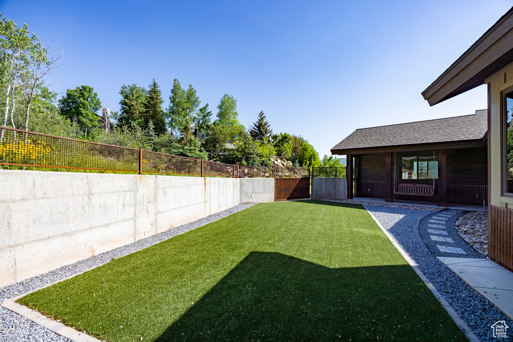 View of fenced backyard