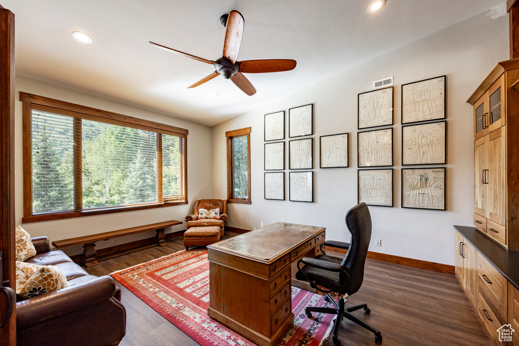 Office area with dark wood-type flooring, recessed lighting, and a ceiling fan