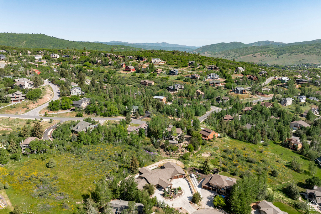 Aerial view of residential area with a mountainous background