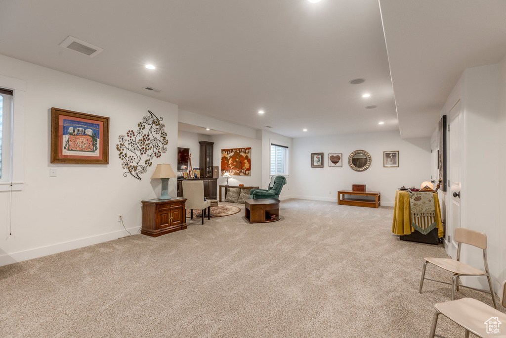 Sitting room featuring carpet and recessed lighting