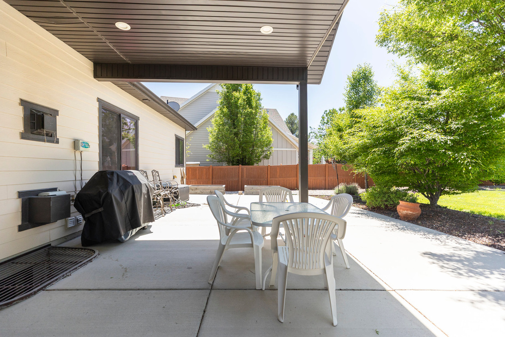 View of patio / terrace featuring grilling area and outdoor dining space