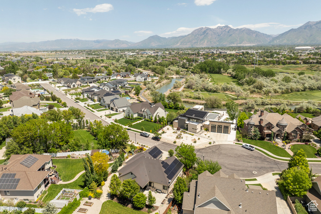 Aerial view of residential area with a mountain backdrop