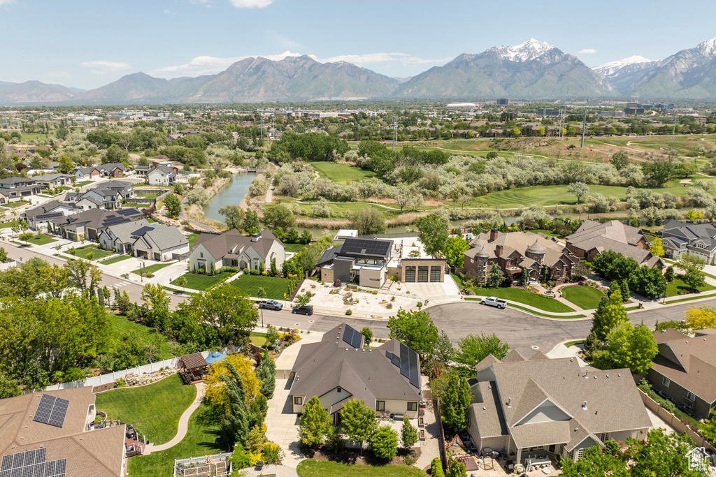Aerial view of residential area featuring mountains