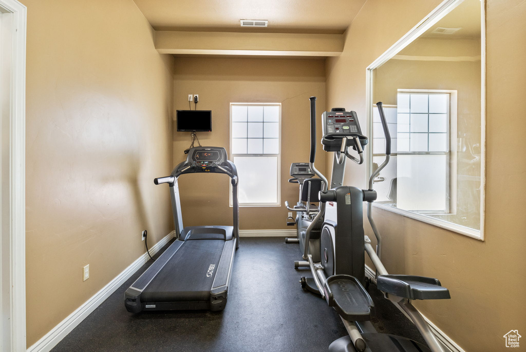 Workout room with baseboards