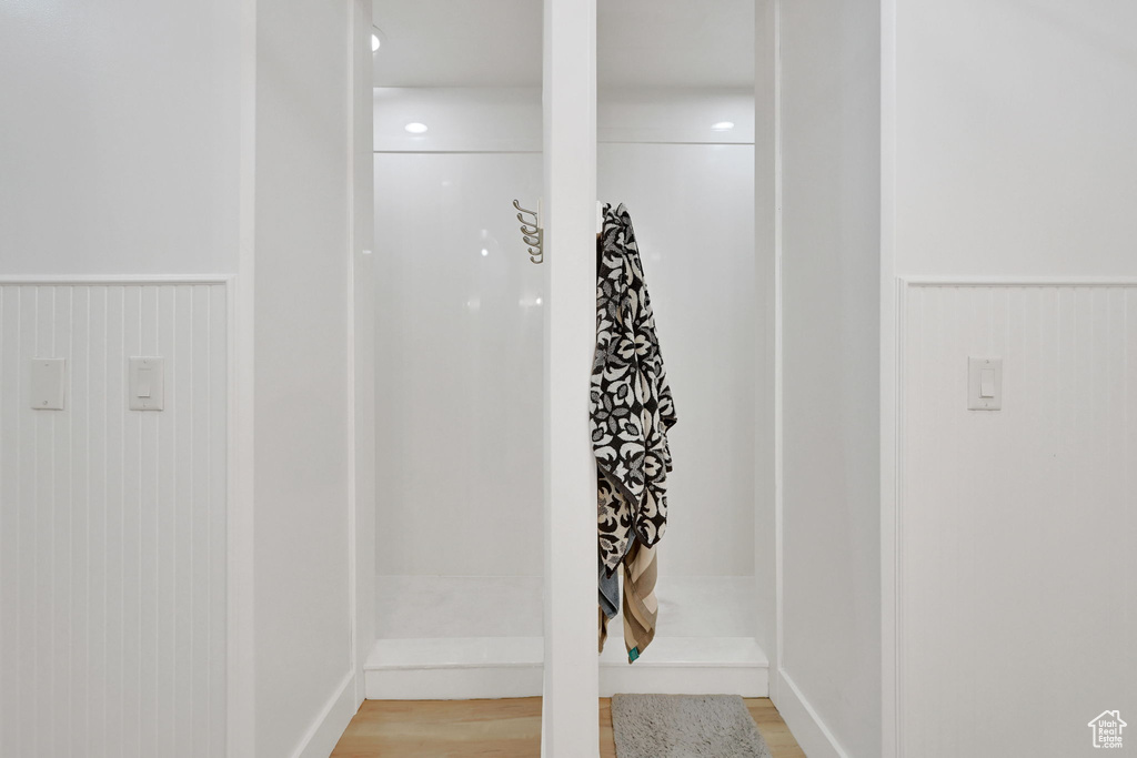Detailed view of wainscoting and wood finished floors