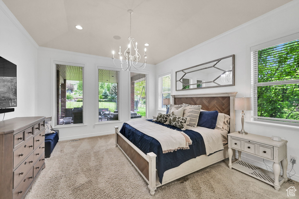 Bedroom featuring a chandelier, crown molding, carpet floors, and recessed lighting